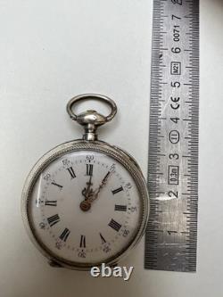 Montre de poche ancienne en argent massif à clé cadran émail chiffres romains