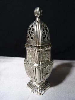 Saupoudreuse en argent massif balustre ancienne sur piédouche à décor ange putti