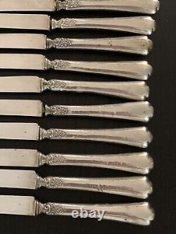 Série de 16 couteaux lames et manches en argent massif Minerve anciens