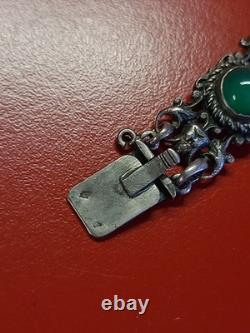 Très beau ancien bracelet articulé en argent massif et cabochons vert sanglier